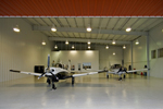 Building Types Image of the inside of a Aircraft Hanger.