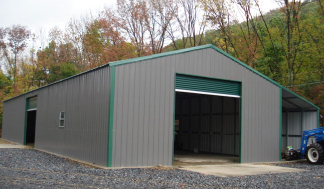 Metal Building Garage Steel Building Grey in Color with Center Roll up Door.